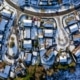 Winter scene overhead aerial view of suburban cul de sacs with light cover of snow